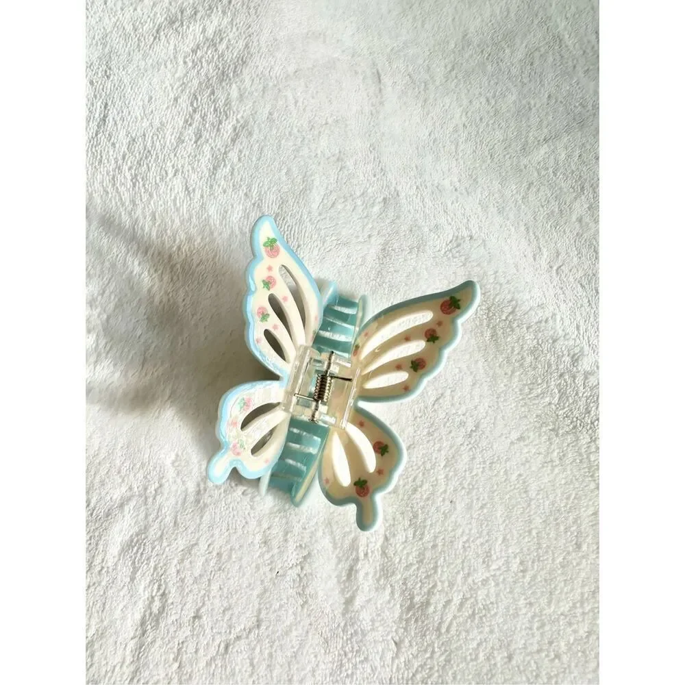 Adorable strawberry pink, blue, and cream - butterfly hair claw ￼